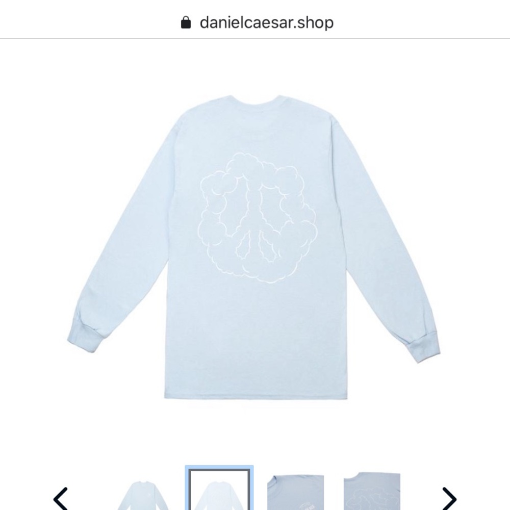 Daniel Caesar “finally found peace” tee